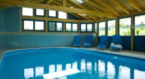 Familienfreundliches Apartment mit Grill, Garten und beheiztem Pool | Gartenblick - Image 4