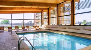 Concepción Aparthotel con piscina temperada - Image 2