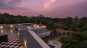 SaffronStays Peshwaai - 5BR Karjat villa with lawn pool & terrace plunge, mezzanine family rooms, near Songiri & Kondhana - Image 3