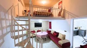 ZenStay Residences Modern Apartments Near City Center With Balcony And Wifi - Image 2