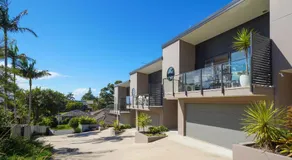 Stylish 4BR Retreat with Water Views - Image 5