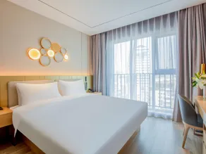 Orange Hotel Yantai Railway Station Wuyue Plaza - Image 2