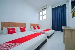 Hotel O Sp Berlian Inn - Image 2