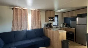 Bungalow 575 6 à 8 pers, Wifi gratuit, Camping 4 étoiles Lac des Rêves Vue Exceptionnelle sur le lac sans vis à vis - Image 2