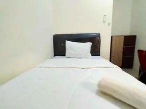 RedDoorz Syariah @ Danesti Homestay Near Bandara Sultan Hasanuddin - Image 1