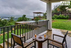 Waterfront Villa with Infinity Pool & BBQ Grill at Pune by StayVista - Image 5