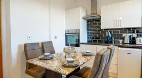 Zeenat Central Bury - Modern 2BR with Free Parking Sleeps 6 - Image 3