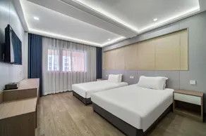 OYO Xinghe Business Hotel - Image 5
