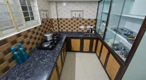 TrueLife Comfort Inn - Near PS4 veg restaurant - On way to Balaji Temple - 2BHK AC apartments - Coffee Tea Milk - Fast WiFi, Kitchen, Dining, Android TV, Parking - Easy access to Airport, Railway Station and to all Temples - Top service with lots of Love - Image 3