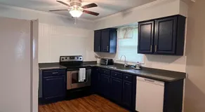 Cozy Stay Near DT with Deck and Yard - Image 4