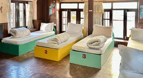 Yog Hostel- Best Social Backpacker Hostel in Thamel -Rooftop-Capsule Bunks AC - Image 2