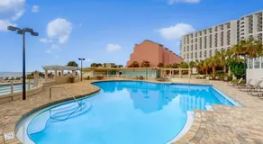 Elegant 9th-Floor Condo with Pools and Gym - Image 4