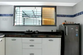 well maintained property with pool near surat - Image 5