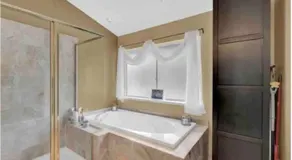A master suite with own kitchenette and bath - Image 2