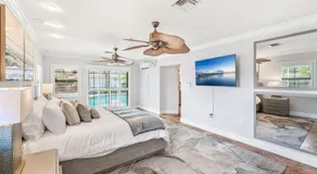 Casa De Olas - Waterfront Luxe Home - Heated Pool - Game Room - Boat Lift - Minutes to Beach - Image 2