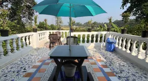 Indigo Orchid Homestay - A spacious, serene villa with terrace and farm view - Image 3