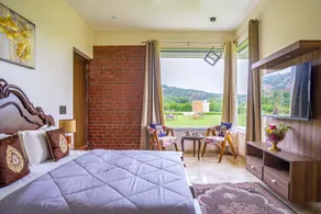 StayVista at Hillside Paradise with Pool, Jacuzzi, kids play area - Image 2
