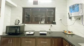 Nisarg Homestay with Kitchen Dinning - Image 5