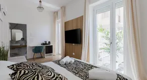 New Elegance Suites Guesthouse - Image 2