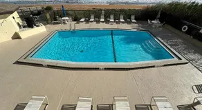 Oceanfront with great beach views from all rooms & balcony, heated pool, and garage - Image 5