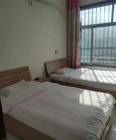 Quanxiang Supermarket Hotel - Image 2