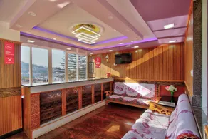 Capital O Hotel Rain Forest - Image 2
