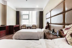 Sanyi Jianshe Hotel - Image 5