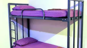 Adigas Homestay Dharmasthala -Suite Room with Balcony (AC) - Image 5