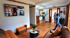Apartahotel La Gran Familia - Image 4