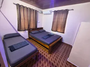 Adigas Homestay Dharmasthala -Suite Room with Balcony (AC) - Image 2