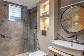 tisyastays | Ands 1BHK Pool & Gym , Close to beach - Image 4