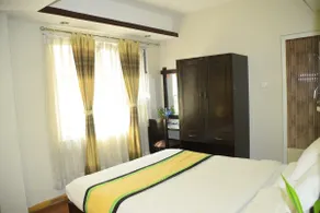true budget comfortable queen bedroom with attach bathroom in thamel - Image 2