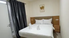 NiEr Guesthouse Zwei Syariah - Image 2