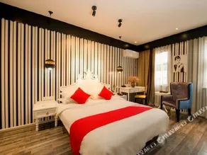Qing Niao Yi Shu Hotel - Image 5