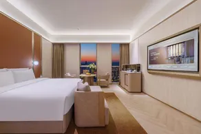 Dalian High-Tech Wanda Plaza Maritime University Crystal Orange Hotel - Image 2