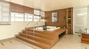 Studio moderno em condomínio de luxo pé na areia - Image 2