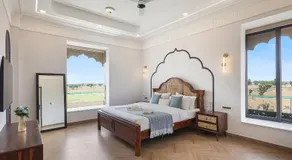 ELIVAAS Signature Nirvana Farms 5-BHK Farmhouse with Private Pool, Lounge Area and Garden - Image 2