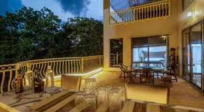SaffronStays Aura - 4BR luxury pool villa with gym, BBQ deck, lawns & indoor games near Kihim Beach - Image 3