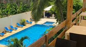 ApartaHotel Dona Reyna Alojamientos en Santo Domingo a 5 min de Aeropuerto Internacional Las Américas - Image 2