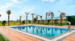 ELIVAAS Signature Nirvana Farms 5-BHK Farmhouse with Private Pool, Lounge Area and Garden - Image 4
