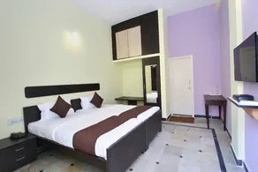 OYO Sri Sai Guest Inn Near Ragigudda Sri Prasanna Anjaneyaswamy Temple - Image 2