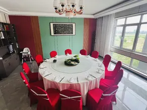 Jufeng Town Hongxilou Business Hotel - Image 4