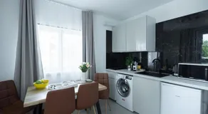 Green Garden & Private Parking Apartments with Playground - Image 5