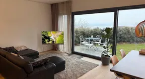 Spacious apartment with lake view and garden - Image 2