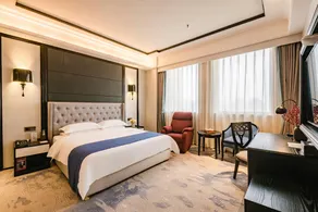Xinhua Zhongzhou International Hotel - Image 2