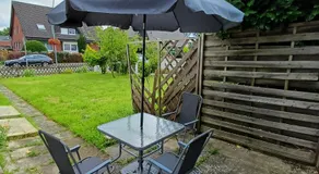 Stay Nest Komfort Ferien- und Monteurwohnungen Küche-Garten - Image 4