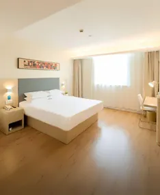 HuaTing Hotel (Lixin Colorful World Branch) - Image 2