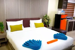 Ambrosial Suites Deluxe Room-WalkingStr - Image 3