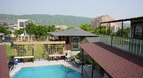 Skyza farms 5 BHK Rustic Villa with Pool & Garden - Image 5