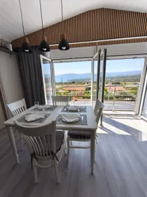 Sunny Home Loutraki is a modern studio with views of the bay and mountains with private parking - Image 2